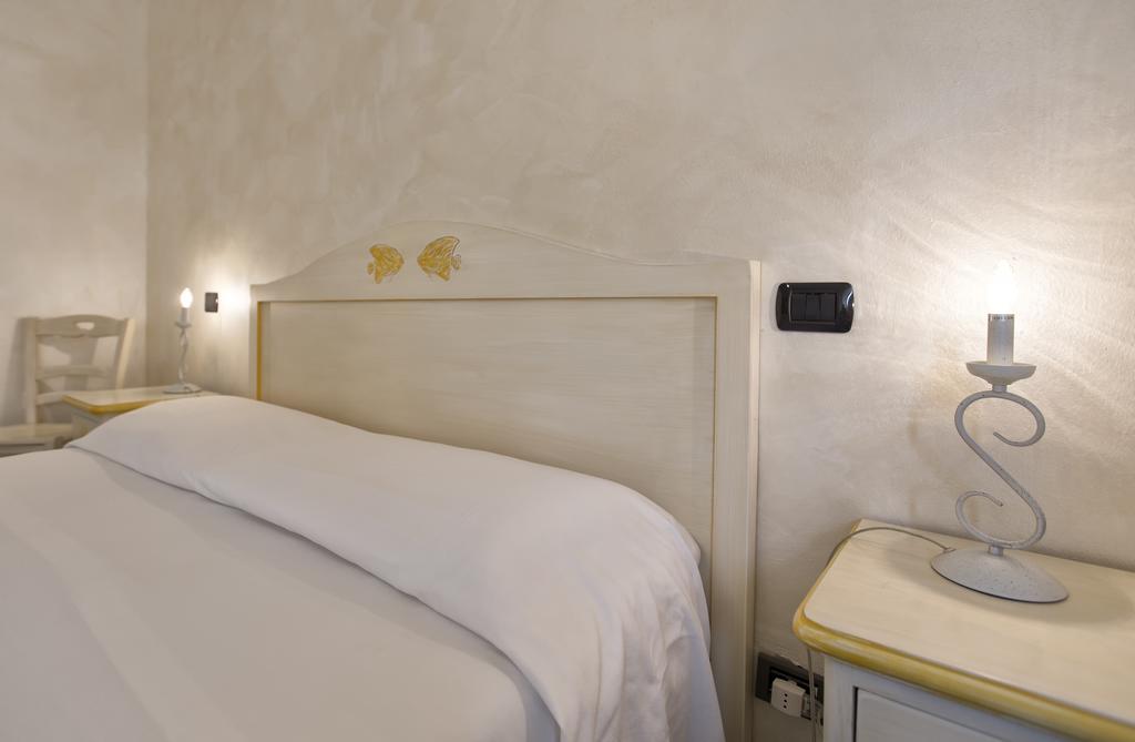 Morpheo Rooms Alghero Bagian luar foto
