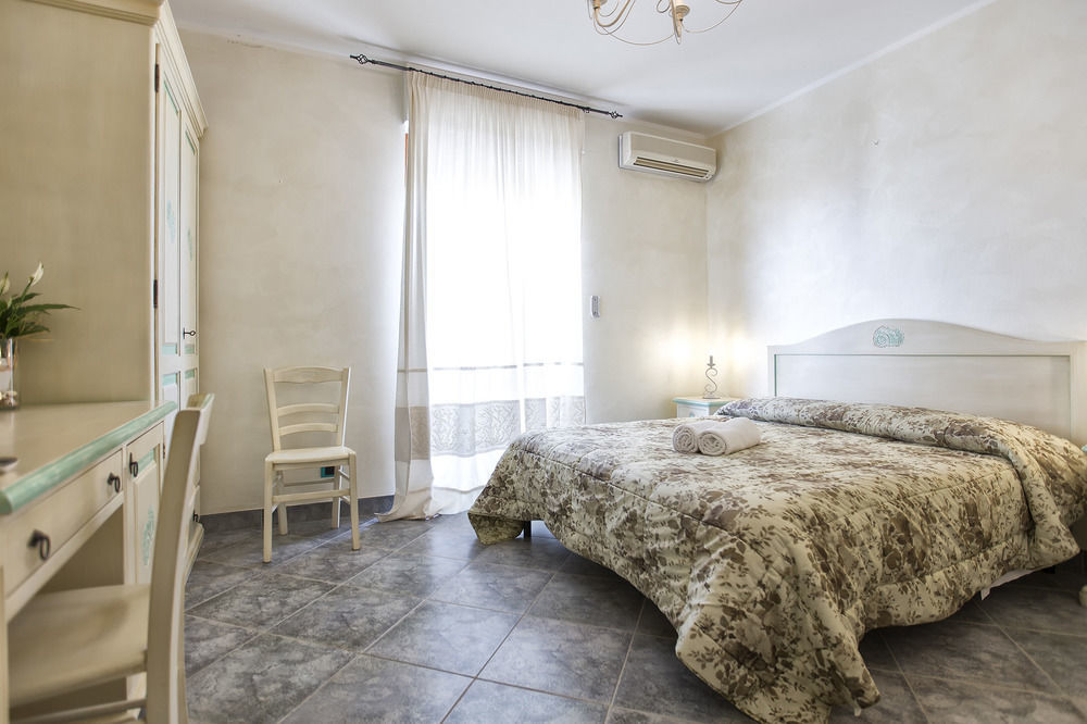 Morpheo Rooms Alghero Bagian luar foto